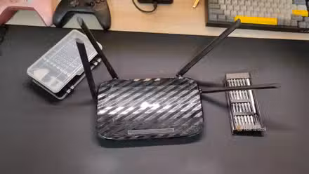 A Wi-Fi router with angled antennas.