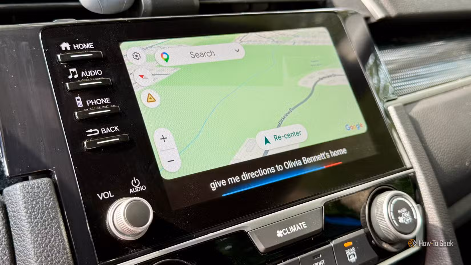 Google Maps app open on Android Auto with Google Assistant enabled.