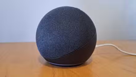 Image of Amazon Echo Gen 4 speaker on desk.
