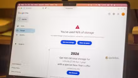 A computer on the Google One storage page showing the account is nearing the free 15GB limit.