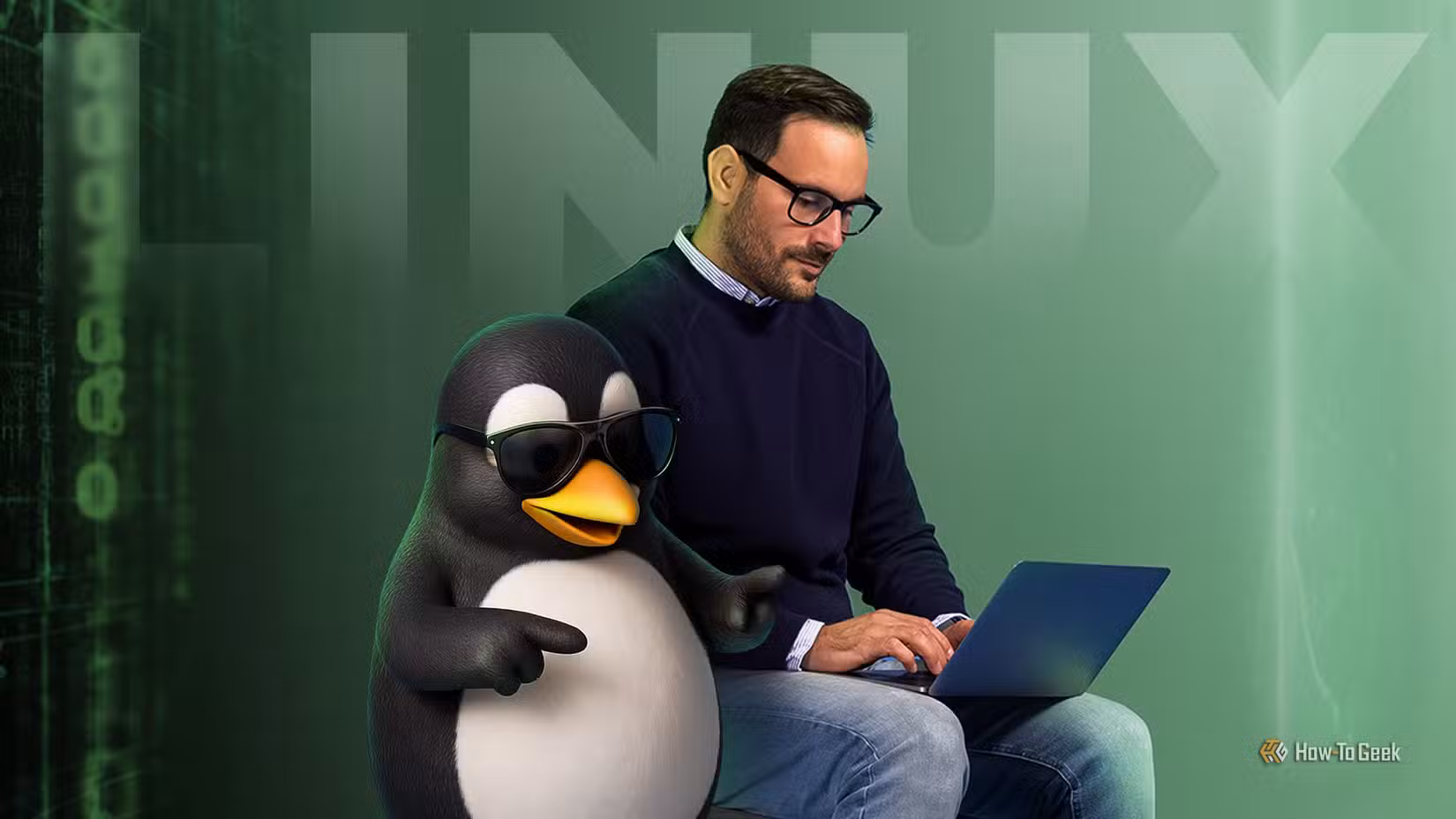 A man using a laptop next to Tux, the Linux mascot wearing sunglasses.