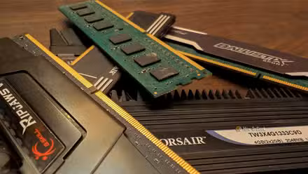 A stack of older RAM on a table.