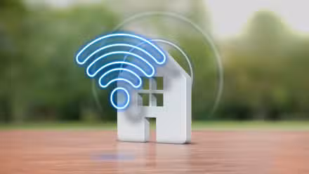 A wooden surface with a smart home icon.