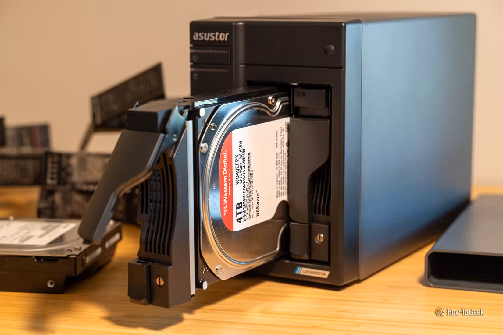 ASUSTOR Lockerstor 2 Gen2+ drive tray with 4TB WD Red Plus NAS hard drive.