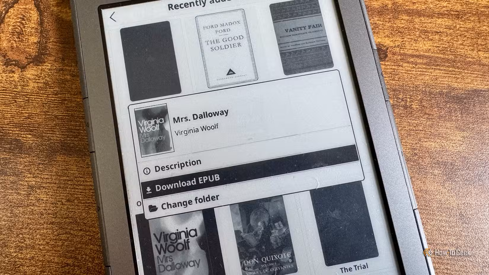 Downloading an EPUB book from Calibre-Web on a Kindle 4 running KOReader.