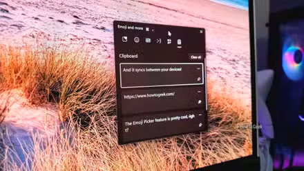 Image of the Windows 11 Emoji Picker shown on a desktop monitor.