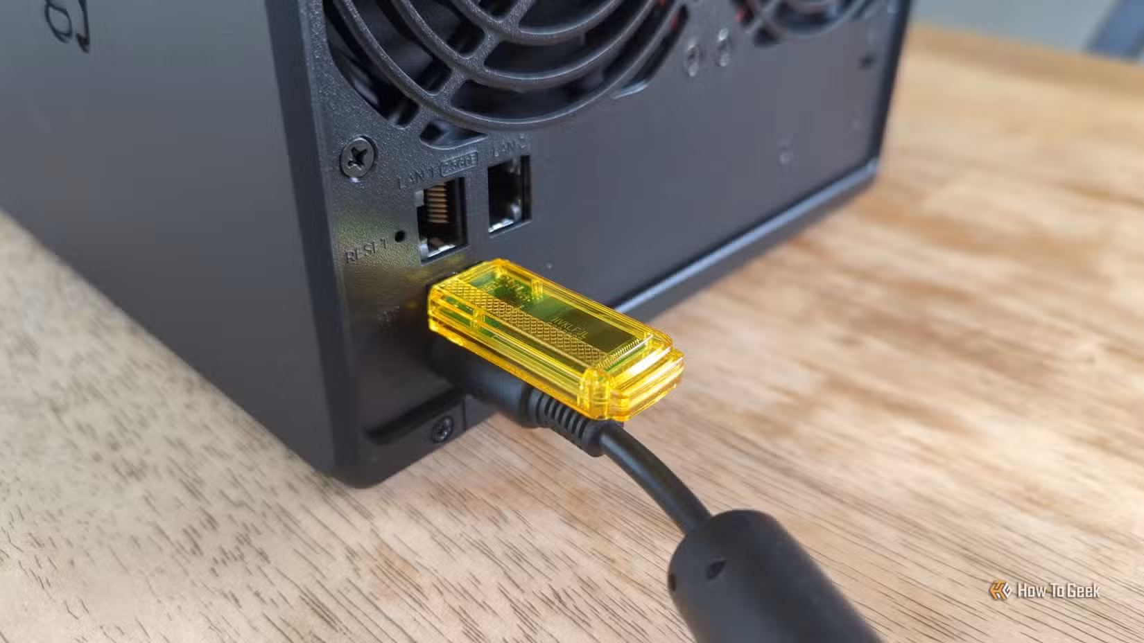 Flash drive plugged into the USB-A port on the back of a Synology DS425+ NAS.-2