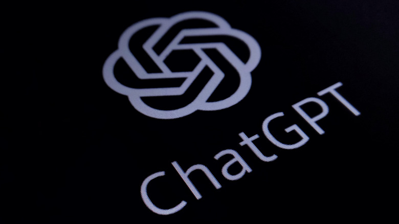 OpenAI's ChatGPT logo displayed on a black screen.