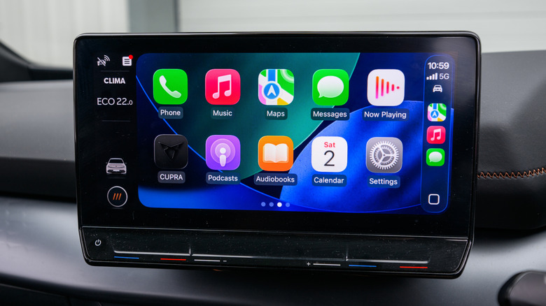 Apple's CarPlay Home Screen on a car's dashboard.