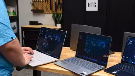 Person testing the performance of a laptop