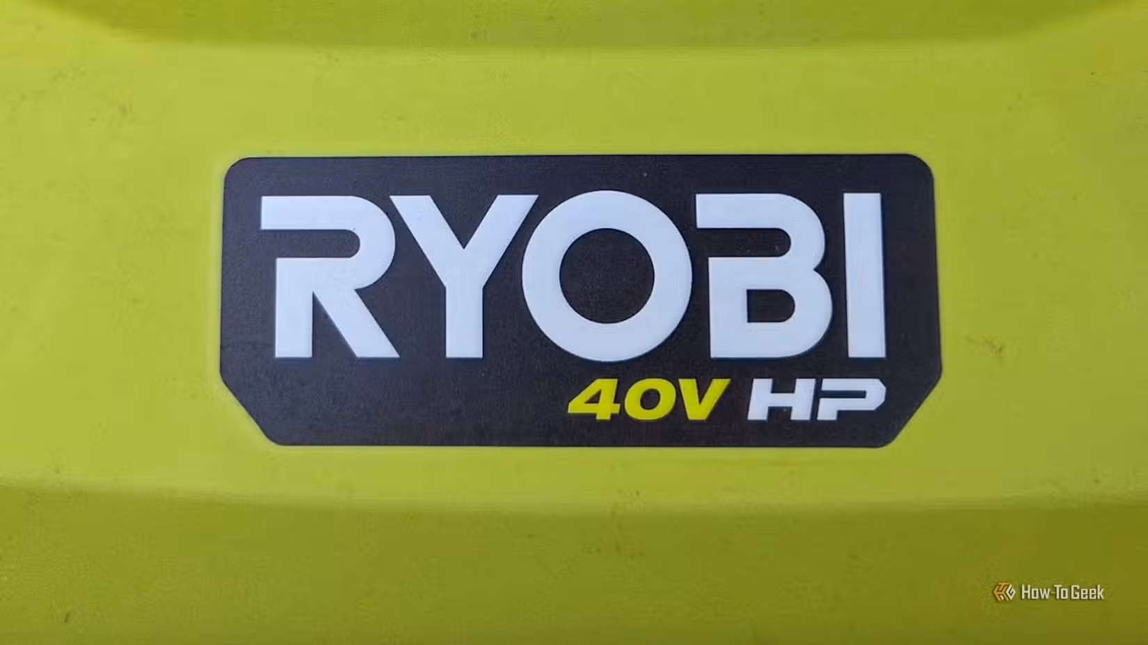Ryobi 40V logo on a lawn mower. 