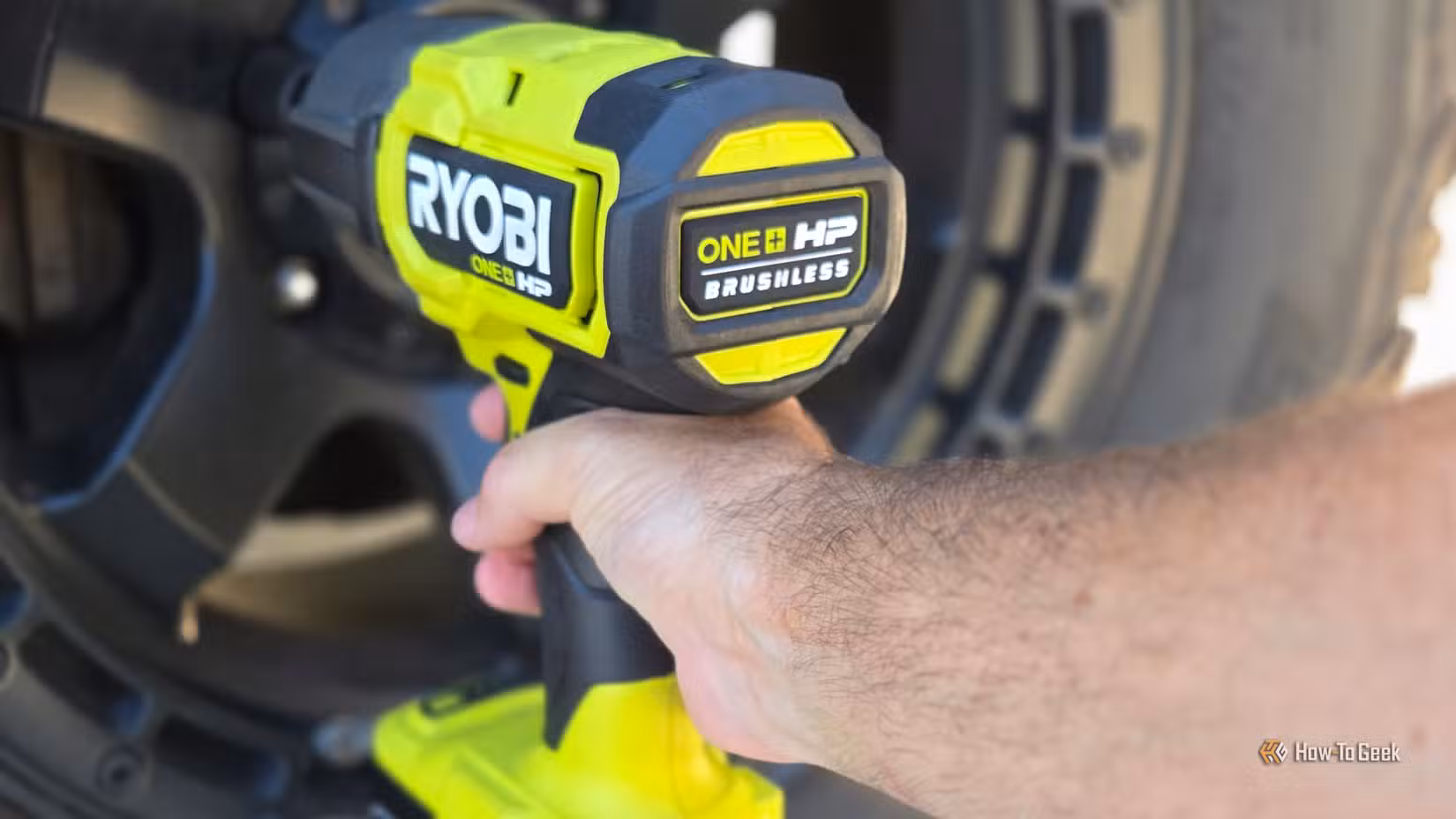 Ryobi High Torque Impact wrench removing lug nuts