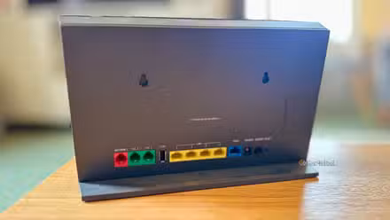 The back of a generic ISP router on a table.