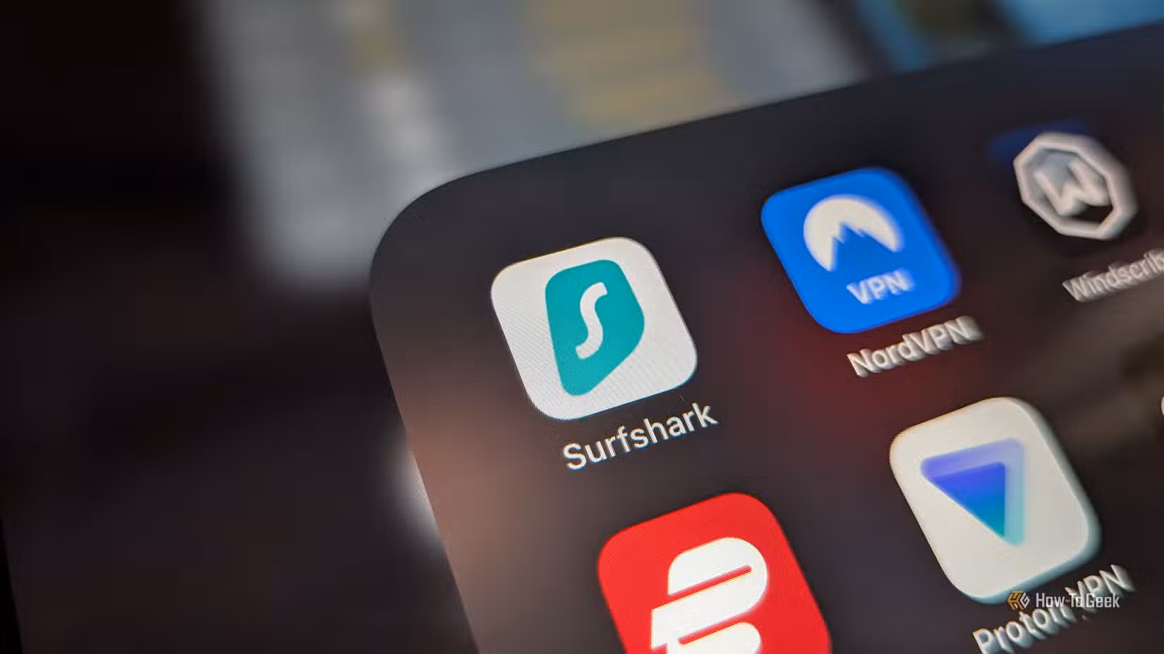 VPN folder on an iPad, with close up on Surfshark