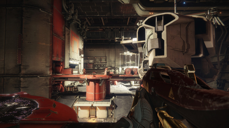 Destiny 2 gameplay showing a weapon aimed across an industrial interior.