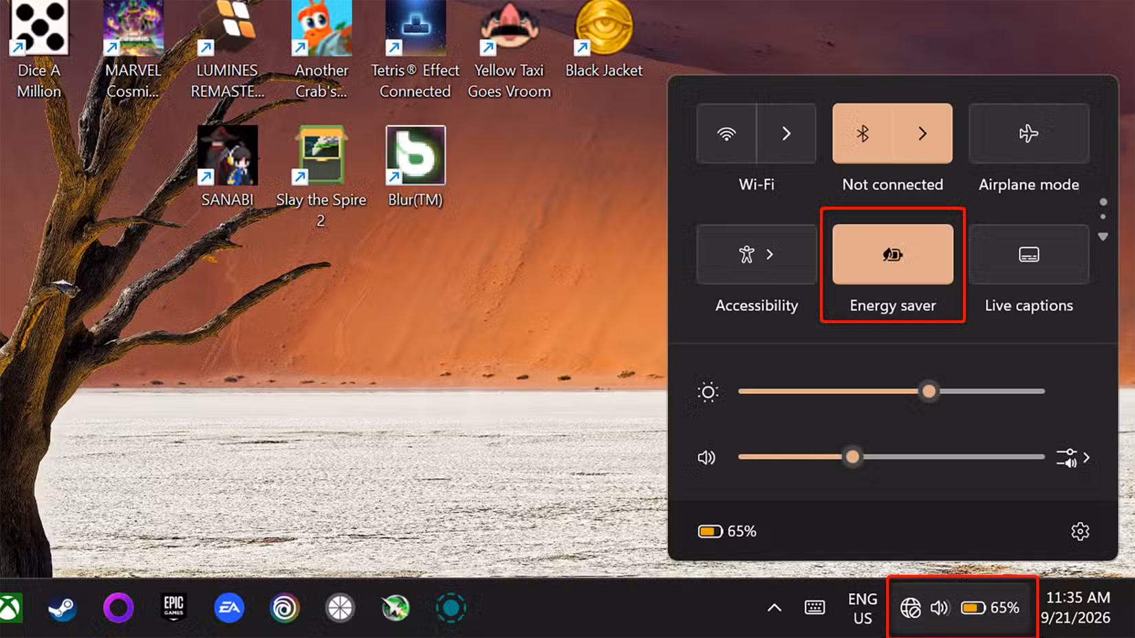 Windows 11 Quick Settings panel with the focus on the energy saver tile. 